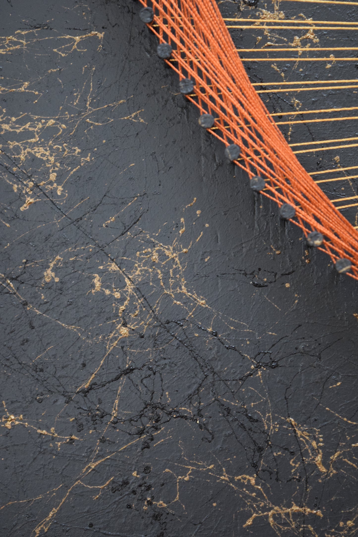 Close-up on the elegant black and gold marble texture in the background – rich contrast enhancing the symbolic composition.