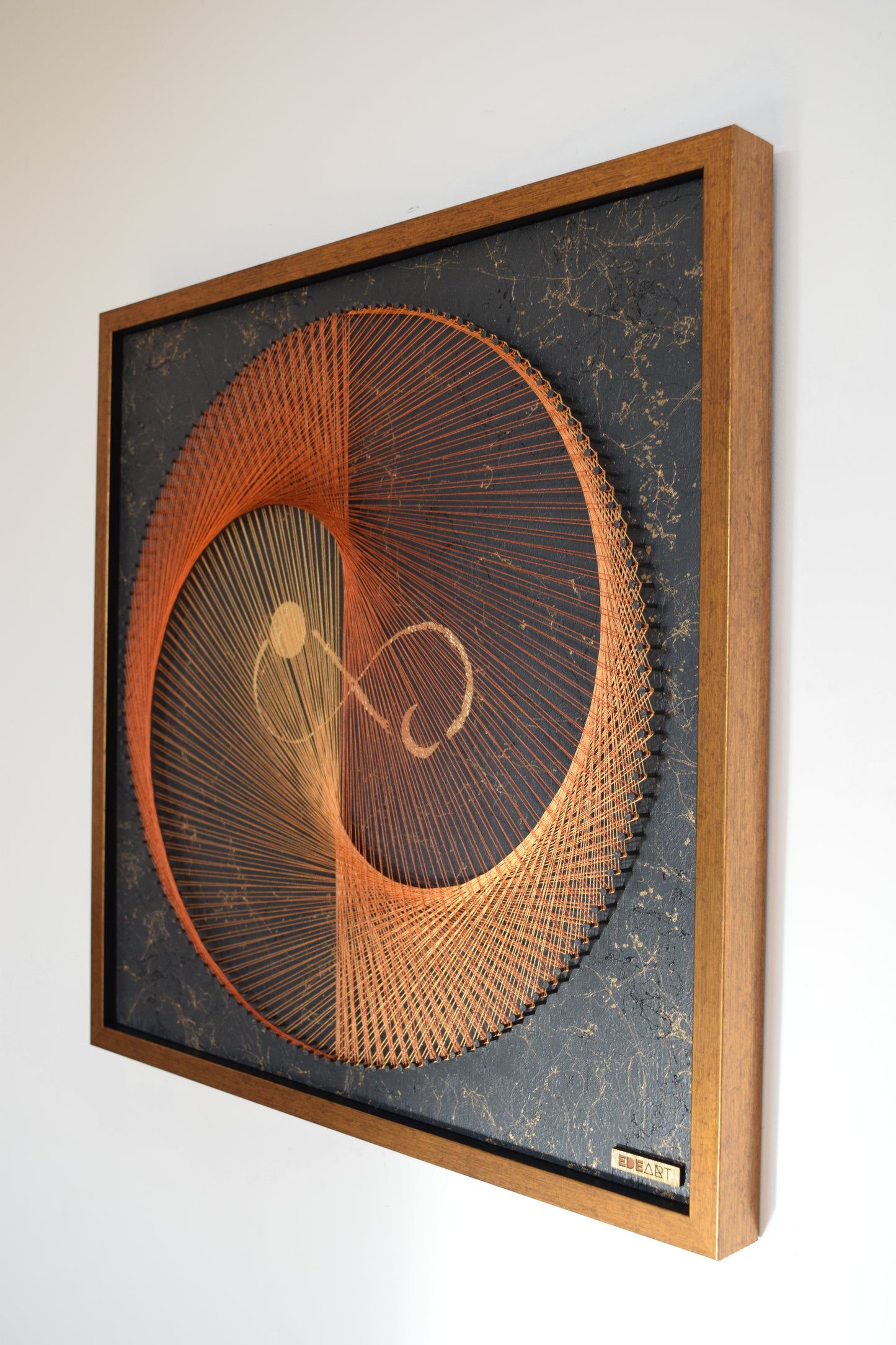 Right angle view of Infinity Yin Yang string artwork, emphasizing the original design and symbolic geometry.